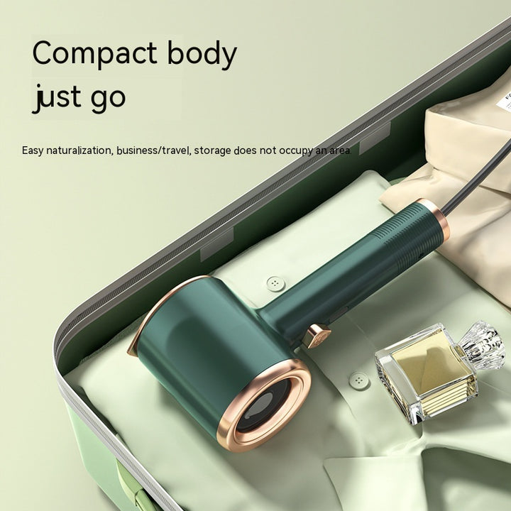 Travel-friendly handheld steam iron with fast heat-up