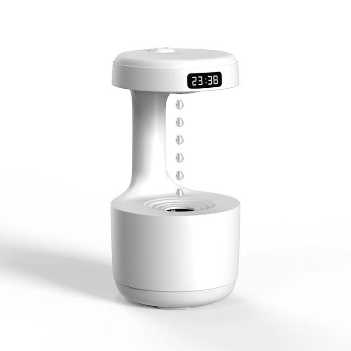 Silent anti-gravity humidifier with decorative water flow